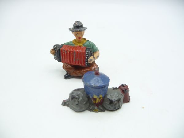 Timpo Toys Accordion player with campfire