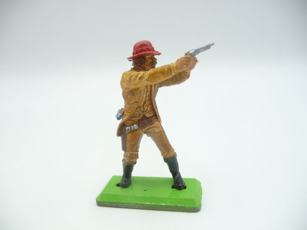 Britains Deetail Cowboy with melon hat, holding / firing pistol with both hands