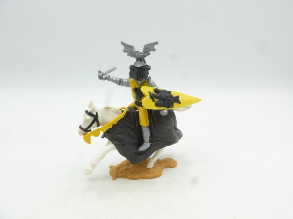Timpo Toys Visierritter reitend, gelb/schwarz mit Schwert + Schild