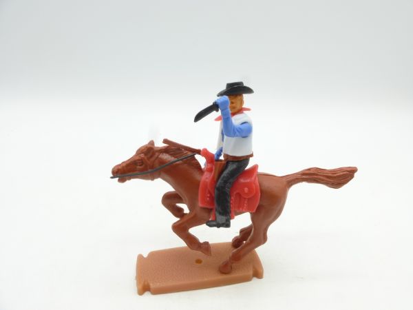 Plasty Cowboy riding with knife + gun