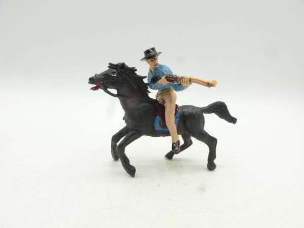Jackson Cowboy reitend, Gewehr schießend - siehe Foto