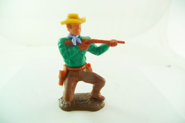 Timpo Toys Cowboy 3. Version kniend mit Gewehr, dunkelgrünes Oberteil
