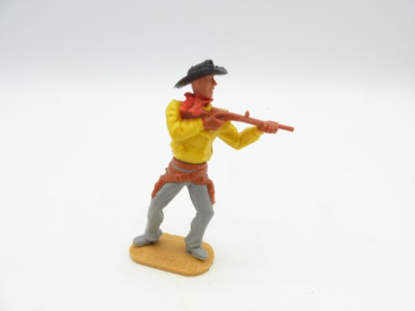 Timpo Toys Cowboy 2. Version stehend mit kurzem Gewehr, Oberteil gelb