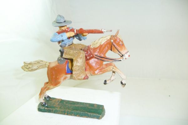 Elastolin Masse Cowboy riding, firing with rifle forward