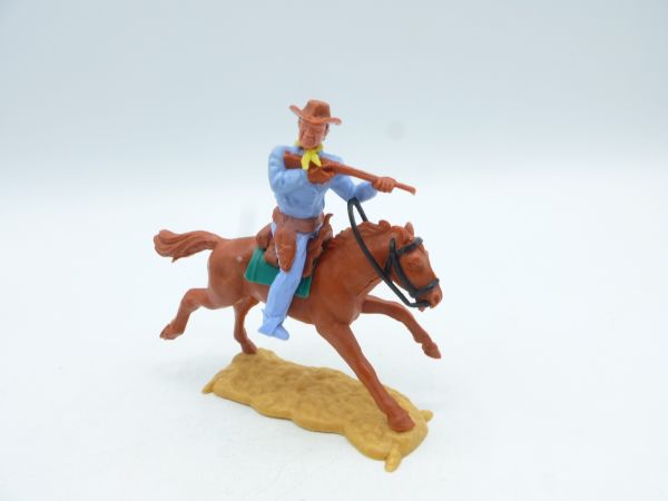 Timpo Toys Cowboy 3rd version on horseback shooting short rifle