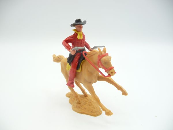 Timpo Toys Cowboy 2. Version reitend, 2 Pistolen schießend - schöne Kombi