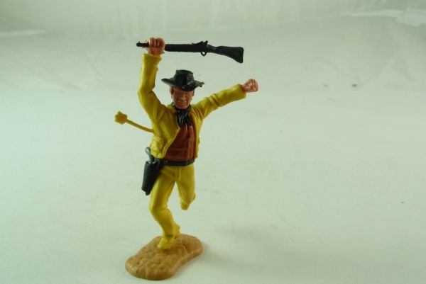 Timpo Toys Cowboy stehend, von Pfeil getroffen, mit seltenem Gewehr