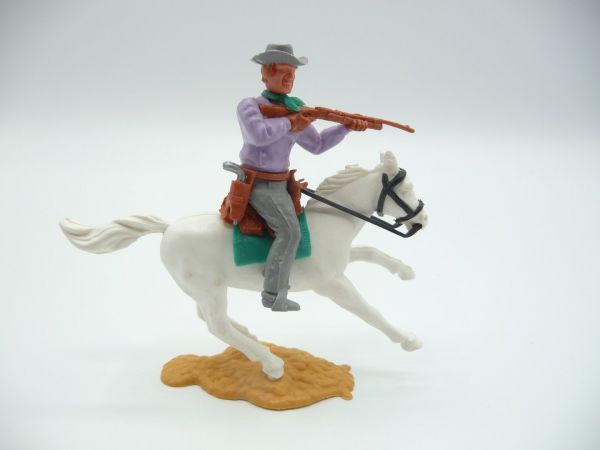 Timpo Toys Cowboy 3rd version riding, firing with rifle