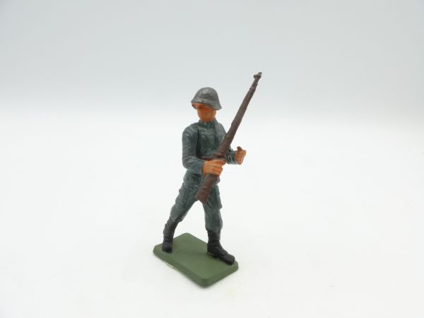 Starlux Schweizer Soldat mit Gewehr vorgehend - mit Originalpreisschild