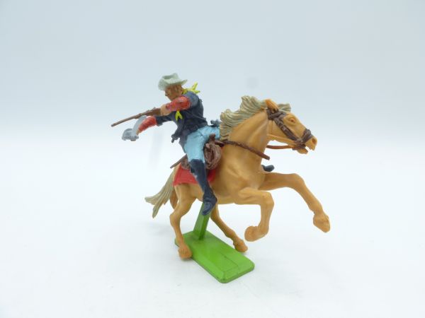 Britains Deetail Soldier 7th Cavalry riding, firing rifle over sabre