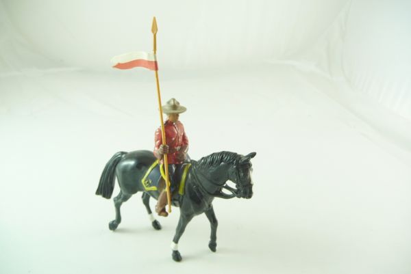 Britains Mountie riding with flag