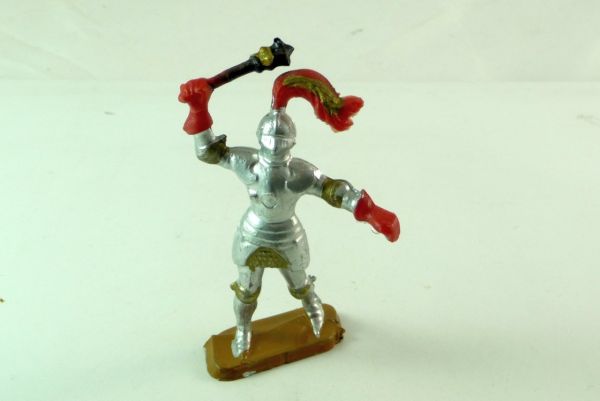 Starlux Knight standing, striking with flail over head