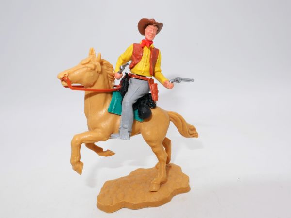 Timpo Toys Cowboy 2nd version riding, firing 2 pistols