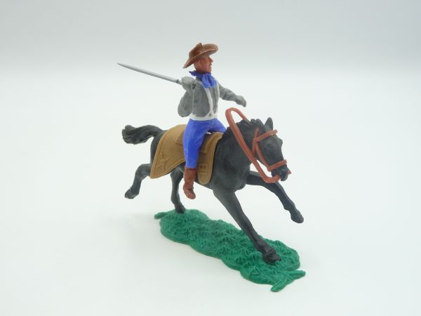 Timpo Toys Confederate Army soldier 1st version riding, striking sabre from above