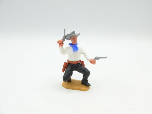Timpo Toys Cowboy 2nd version crouching, firing wild with 2 pistols