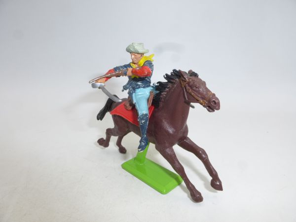 Britains Deetail Soldier 7th Cavalry riding, shooting rifle over sabre