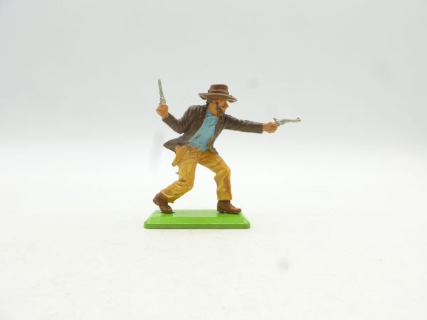 Britains Deetail Cowboy advancing, firing wild with 2 pistols, brown hat