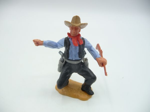 Timpo Toys Cowboy 2. Version hockend mit Gewehr, zeigend