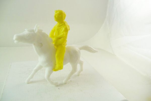 Heinerle / Domplast Cowboy on horseback, holding rifle in front of body, dark-yellow