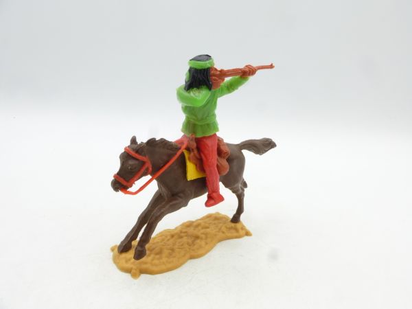 Timpo Toys Apache reitend schießend, neongrün, rote Hose