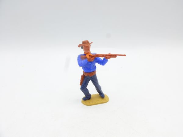 Timpo Toys Cowboy 3rd version (big head) standing with rifle