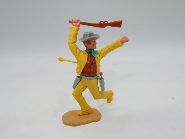 Timpo Toys Cowboy 3. Version laufend, von Pfeil getroffen, gelbe Hose