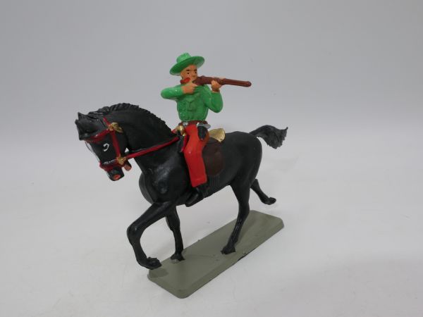 Starlux Cowboy on horseback, shooting rifle sideways