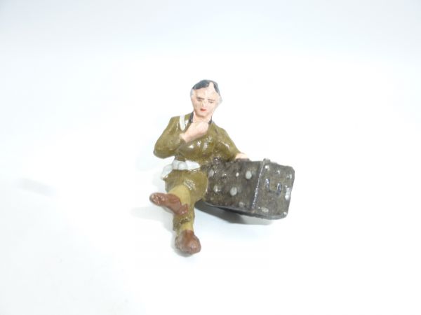 Soldat sitzend mit Funkgerät (ähnlich Lineol)