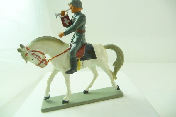 Starlux Swiss soldier riding with trumpet