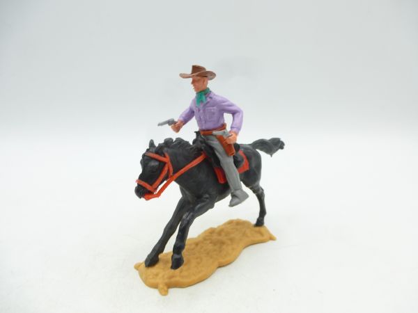 Timpo Toys Cowboy 2. Version reitend mit 2 Pistolen schießend