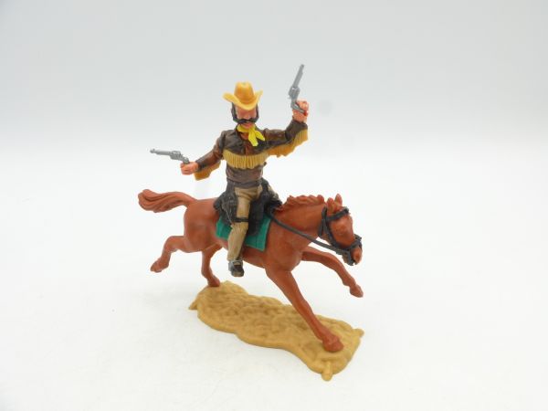 Timpo Toys Cowboy 4. Version reitend, 2 Pistolen wild schießend