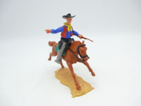 Timpo Toys Cowboy 2nd version riding, pointing, rifle sideways