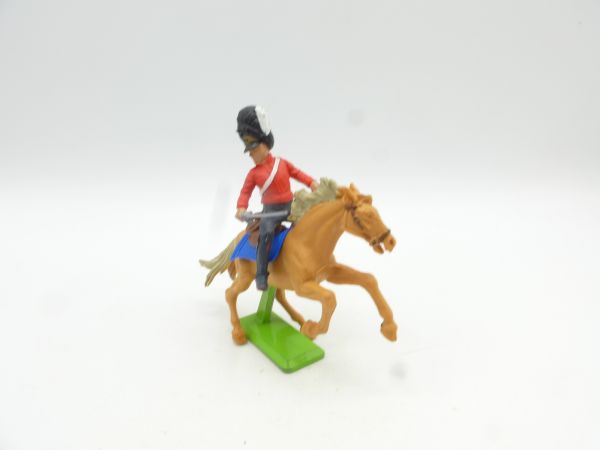 Britains Deetail Waterloo: Soldier on horseback, holding sabre below, red uniform