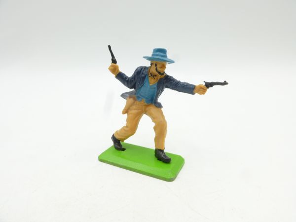 Britains Deetail Cowboy advancing, shooting 2 pistols - brand new