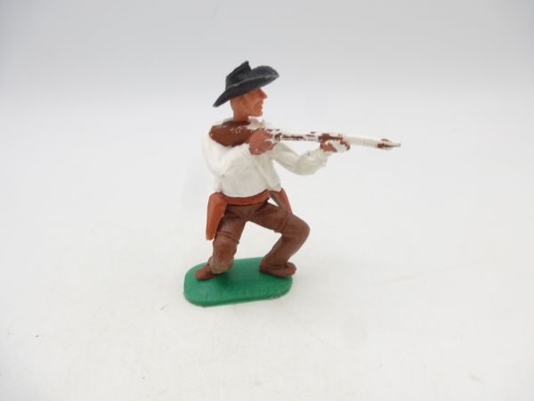 Timpo Toys Cowboy 1. Version, weiß, Gewehr schießend