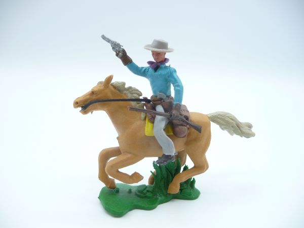 Britains Swoppets Cowboy zu Pferd (galoppierend) mit Pistole + Gewehr