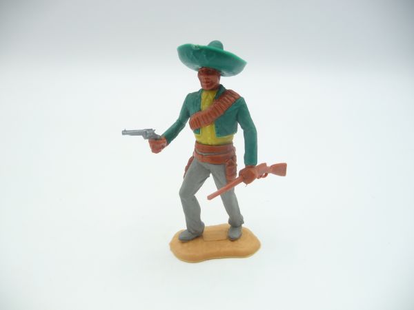 Timpo Toys Mexikaner stehend, grün/gelb, brauner Gurt mit Gewehr + Pistole