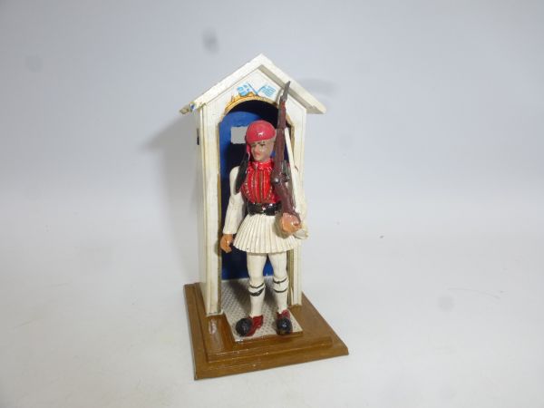 Aohna Greek Evzone music corps soldier with guard house