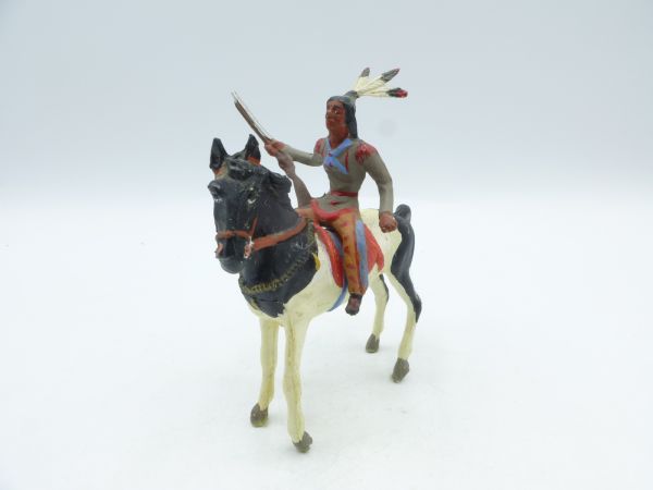 Merten Indian on standing Mustang, rifle sideways