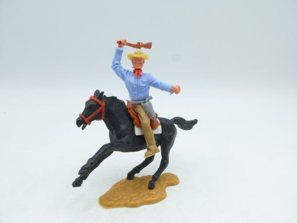 Timpo Toys Cowboy 3. Version reitend, Kolben schlagend
