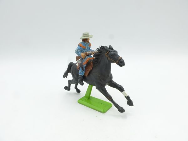 Britains Deetail Cowboy on horseback, rifle in front of body