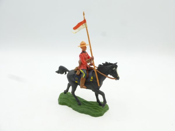 Britains Swoppets Mountie, Canadian policeman on horseback with flag