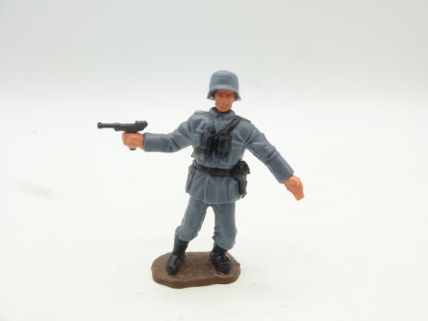 Timpo Toys German standing firing pistol, loose helmet