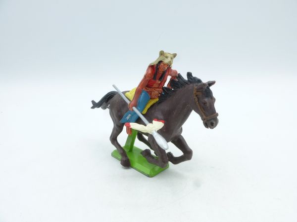 Britains Deetail Indian riding, holding spear sideways, with bearskin
