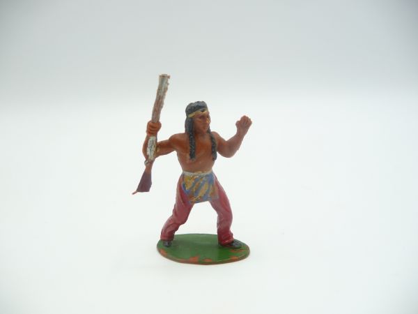 Timpo Toys Indianer mit Gewehr vorgehend, 2. Version, rote Hose, blauer Schurz