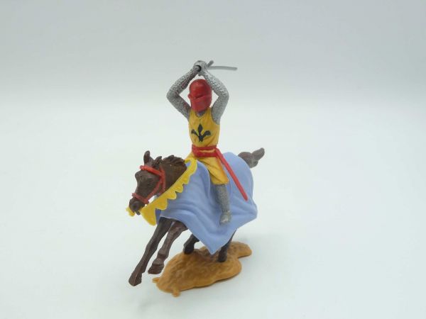Timpo Toys Medieval knight riding, striking ambidextrously over head, yellow/red