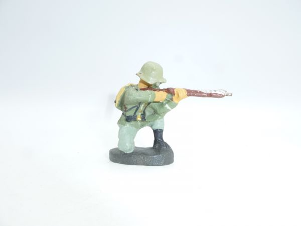 Elastolin composition Soldier with respirator, kneeling shooting