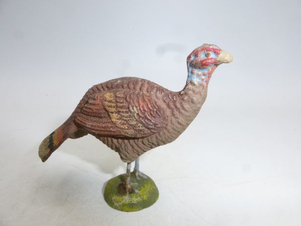 Elastolin (compound) Turkey hen - comb on the head missing
