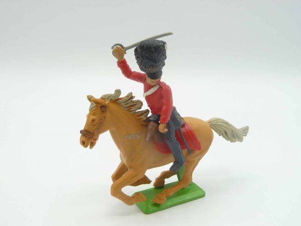 Britains Deetail Waterloo; soldier riding, red, striking sabre from above, looking to the left