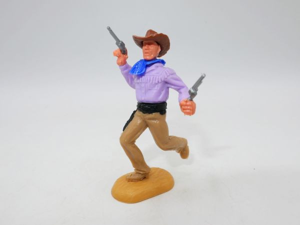 Timpo Toys Cowboy 2nd version running, firing 2 pistols wildly